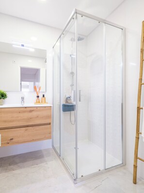 Hair dryer, bidet, towels, soap