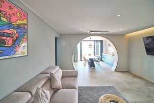 HEMIRION POOL VILLA_PRESIDENT | Living area | 55-inch Smart TV with digital channels, Netflix, pay movies