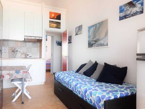 Private kitchen | Fridge, coffee/tea maker, high chair - Welcoming Apartment in Marotta at the Seabeach (Mondolfo)