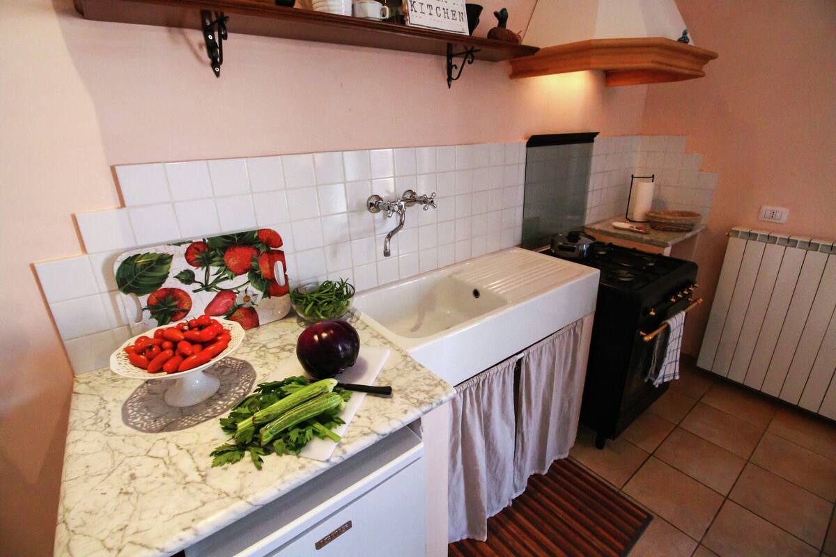 Casa romántica, 1 habitación | Cocina privada | Horno y trona infantil