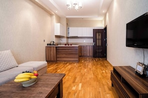 Family Apartment, Balcony, Courtyard View | Living area | Flat-screen TV - Kristal Absheron (Baku)