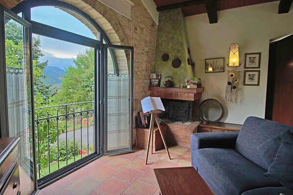 Comfort House, 3 Bedrooms | Living room | Fireplace - Large Holiday Home in Cagli With Pool (Cagli)