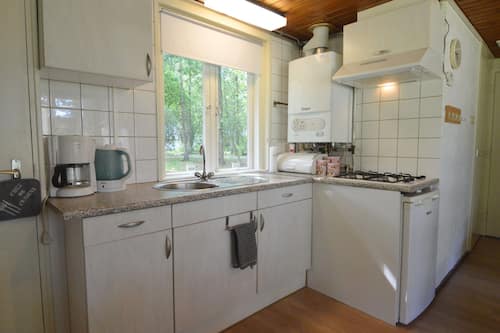 Casa clássico, 2 quartos | Cozinha privada | Micro-ondas, cafeteira/chaleira, cadeirão de bebê