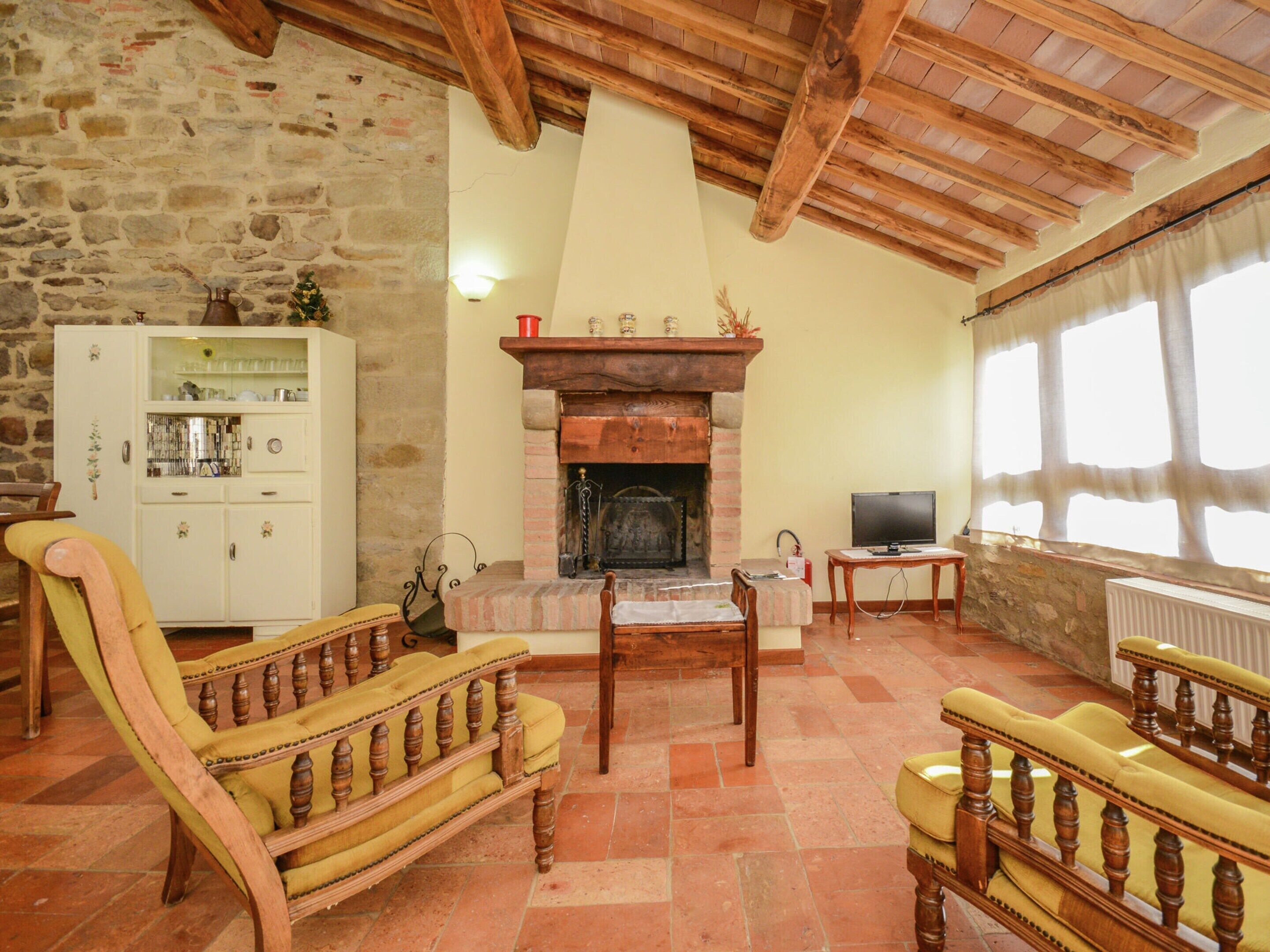 Casa Classic, 1 camera da letto | Soggiorno | Caminetto