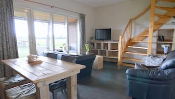 Casa conforto, 2 quartos | Sala de estar
