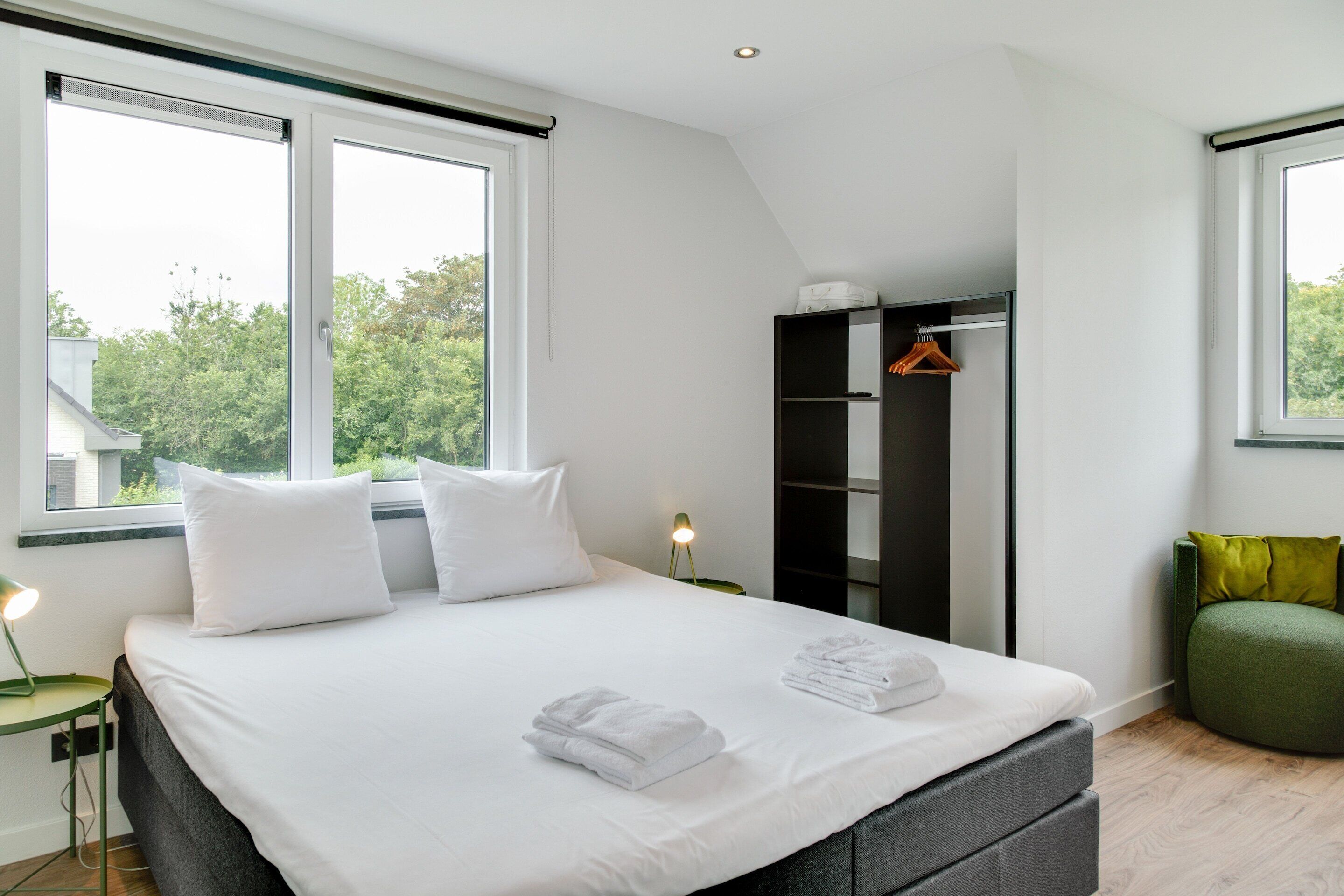 12 bedrooms, individually furnished, bed sheets