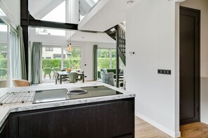 Elite House, 3 Bedrooms | Private kitchen | Fridge, microwave, dishwasher, coffee/tea maker - Great Holiday Home Energy Neutral on Texel With Sauna and sun Shower (De Koog)