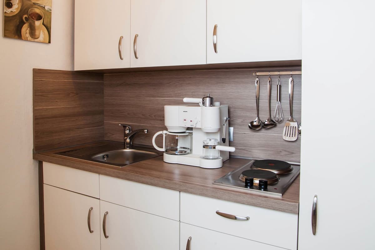 Fridge, microwave, coffee/tea maker, electric kettle