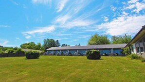 A large, single-story building with a flat roof and a covered outdoor area. - 2 Person Holiday Home in Allinge (Allinge)