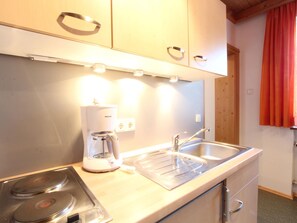 Comfort Apartment, 1 Bedroom | Private kitchen | Fridge, oven, coffee/tea maker