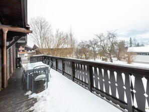 Enjoy al fresco dining on the deck with a table and chairs.