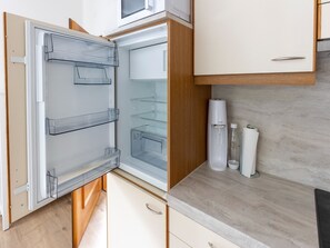 Classic Apartment, 4 Bedrooms | Private kitchen | Fridge, microwave, oven, dishwasher