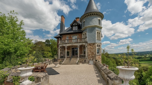 A large, historic house with a prominent turret, stone walls, and a well-maintained garden. - Live Your Dream at This Castle in the City of Spa (Jalhay)