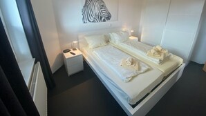 Apartemen Deluks, 2 kamar tidur | 7 kamar tidur dan dilengkapi dengan perabotan berbeda-beda