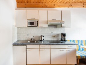 Comfort Apartment, 2 Bedrooms | Private kitchen | Fridge, microwave, coffee/tea maker, electric kettle