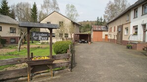 A rural building with a sign reading "Ferienhaus Laux." - Spacious Holiday Home in Ulmen Near the Centre (Ulmen)