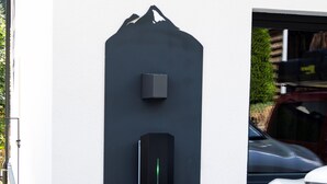 An electric vehicle charging station with a sign indicating 'Auto Ladestation'. - Chalet Montafon in Gaschurn With Sauna (Gaschurn)