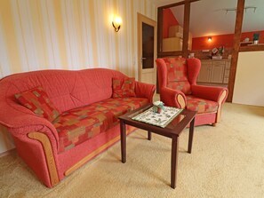 Apartamento conforto, 1 quarto | Sala de estar