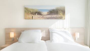 Comfort Apartment, 2 Bedrooms | 4 bedrooms, individually furnished, bed sheets