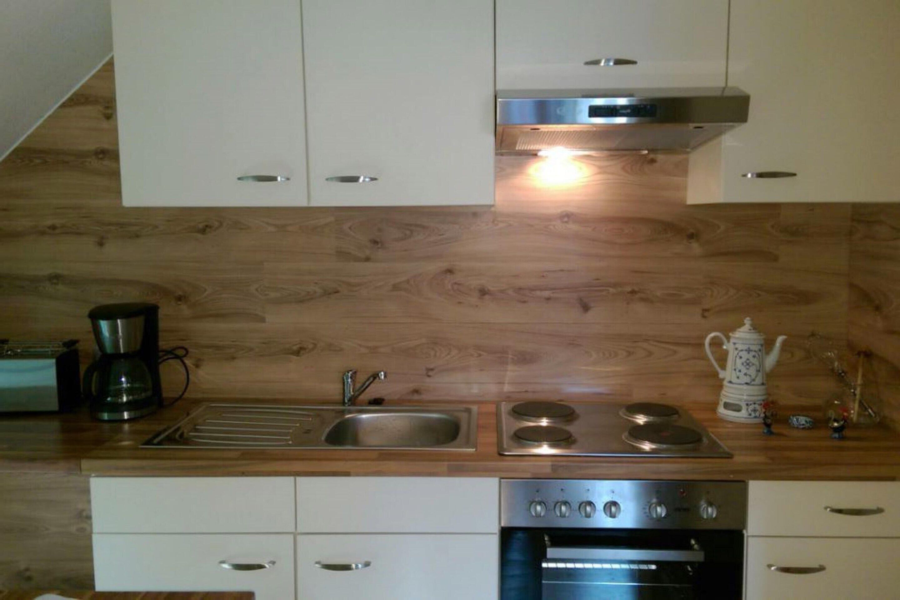 Elite Apartment, 2 Bedrooms | Private kitchen | Fridge, microwave, coffee/tea maker, high chair