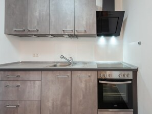 Classic Apartment, 2 Bedrooms | Private kitchen | Fridge, microwave, coffee/tea maker, toaster