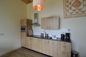 Casa Deluxe, 4 habitaciones | Cocina privada | Refrigerador, microondas, lavavajillas y cafetera y tetera