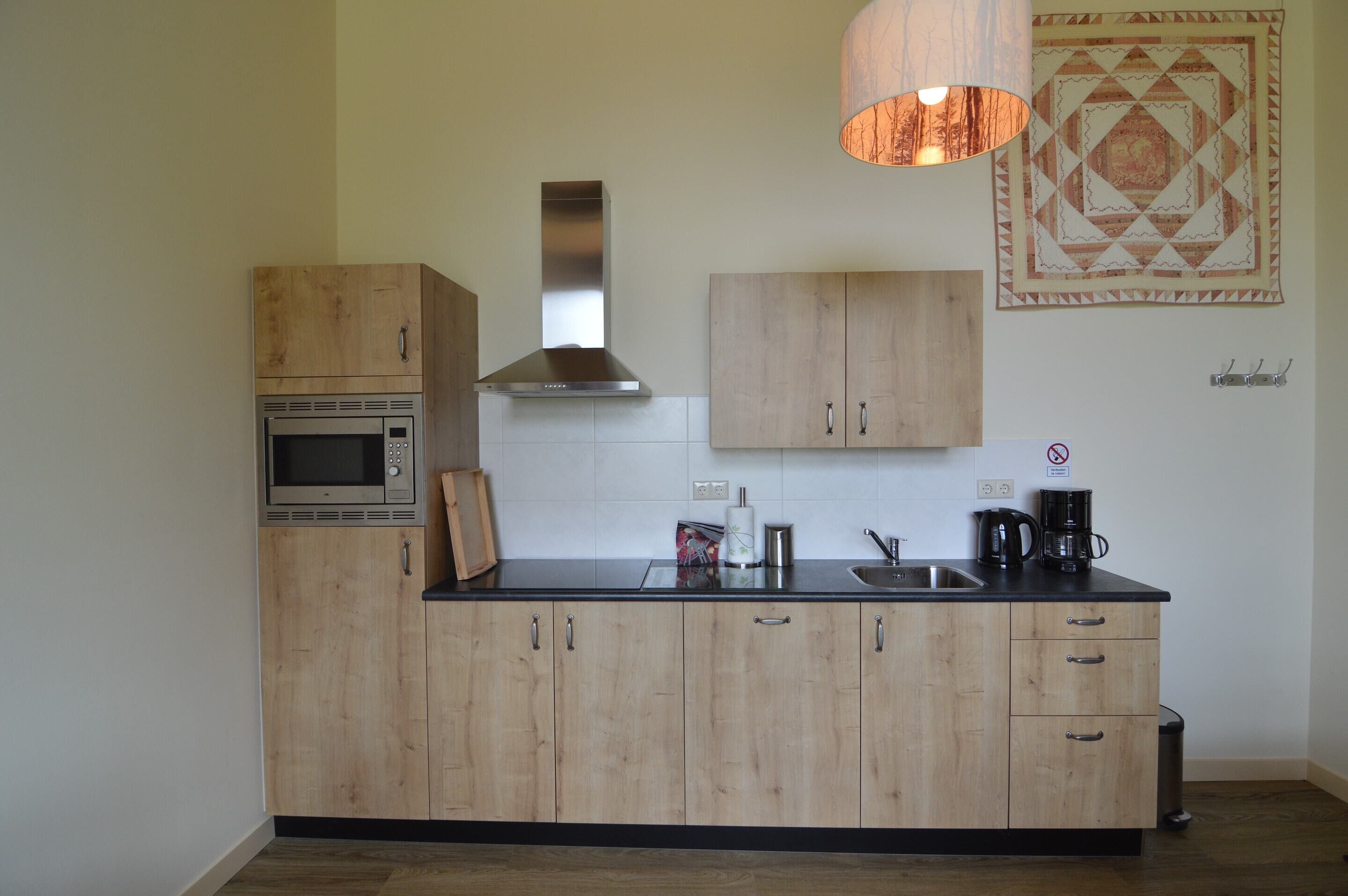 Maison Élite, 2 chambres | Cuisine privée | Réfrigérateur, micro-ondes, lave-vaisselle, cafetière/bouilloire