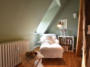Deluxe Apartment, 2 Bedrooms | Living room | Fireplace, DVD player - Historic Apartment in Gerdshagen With Garden (Satow)