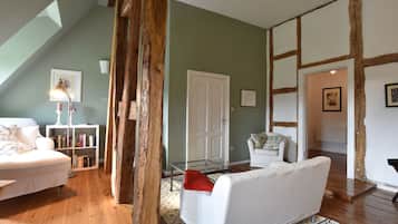 Deluxe Apartment, 2 Bedrooms | Living room | Fireplace, DVD player