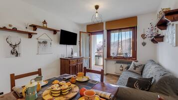 Apartamento familiar, varias habitaciones (Wolf & Deer Apartment Ski-In Ski-Out) | Comedor