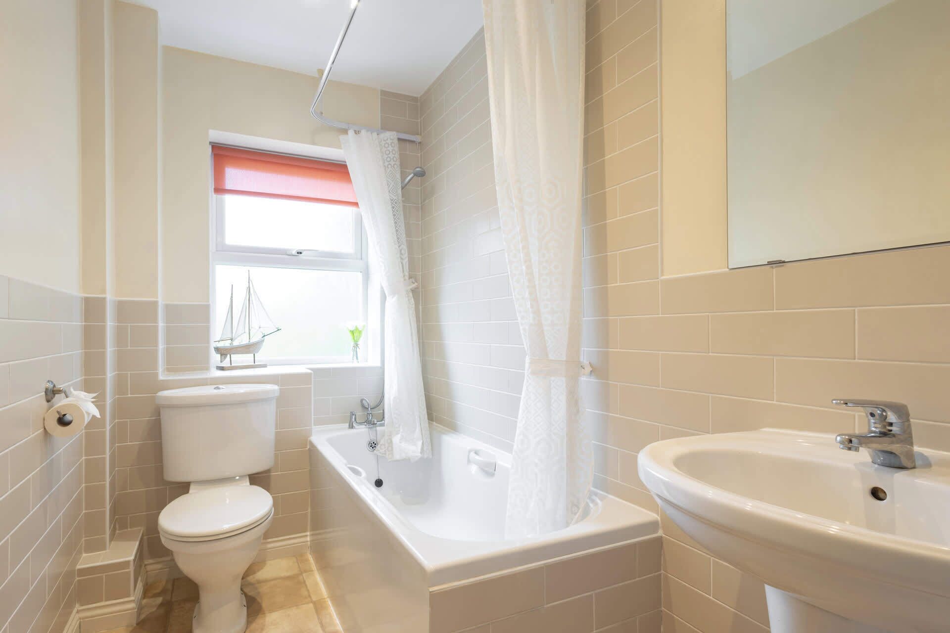 Shower, hair dryer, towels, shampoo