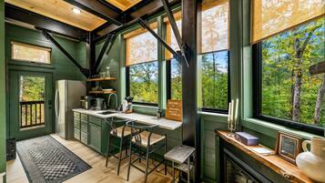 Fridge, coffee/tea maker, cookware/dishes/utensils