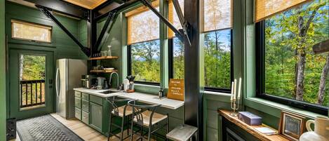 Fridge, coffee/tea maker, cookware/dishes/utensils