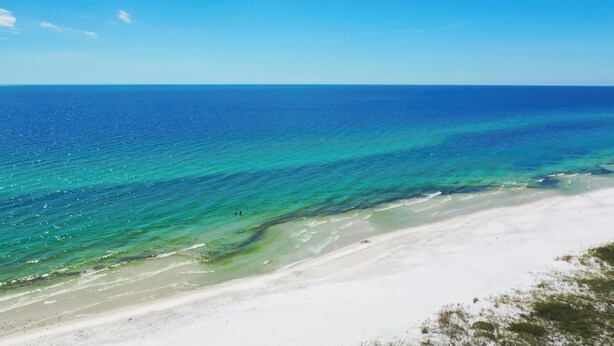 A beach with clear turquoise waters and a white sandy shore. - Outdoor TV, Bikes, Gulf Views, Prime 30A Location, Large Private Pool (Santa Rosa Beach)
