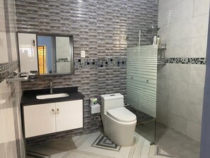 Bidet, towels, soap, shampoo
