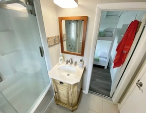Hair dryer, towels, soap, shampoo