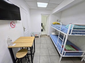 Quadruple Room | Living area | 32-inch Smart TV with digital channels, Netflix, Hulu