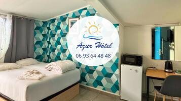 Triple Room | Desk, laptop workspace, blackout drapes, free WiFi