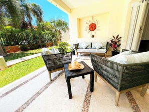 Family Apartment, 2 Bedrooms, Pool View, Ground Floor | Terrace/patio - Relajate hermoso jardín y 2 piscinas (Puerto Aventuras)