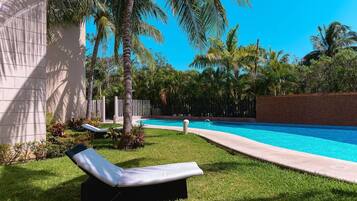 2 outdoor pools, open 7:00 AM to 11:00 PM, pool loungers