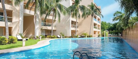 2 outdoor pools, open 7:00 AM to 11:00 PM, pool loungers