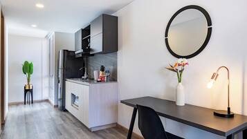 Fridge, microwave, stovetop, coffee/tea maker