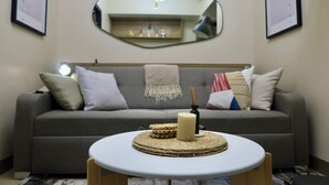 Apartment | Living area - Taguig Grand Suite - Cozy Modern Apartment (Taguig)