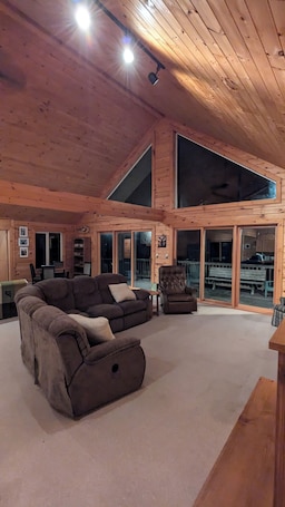 Interior. Lake front timber cottage amongst towering pines. Family and pet friendly
