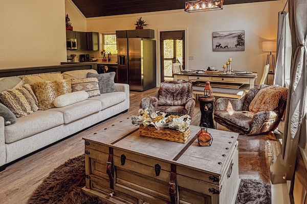 Open family/dining room with cathedral ceilings