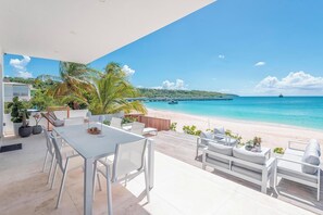 Outdoor dining - Luxury Beachfront Enclave Unit 1 (Sandy Ground)