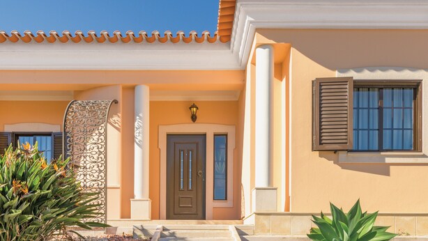 A building with a tiled roof, a central door, and a window with shutters. - Villa 'Beautiful Deluxe 4 Bedroom' with Private Pool, Garden & Wi-Fi (Brescos)