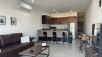 Standard Apartment, Bay View | Living area | 32-inch flat-screen TV with digital channels, Netflix