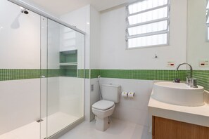 Shower, hair dryer, towels, shampoo