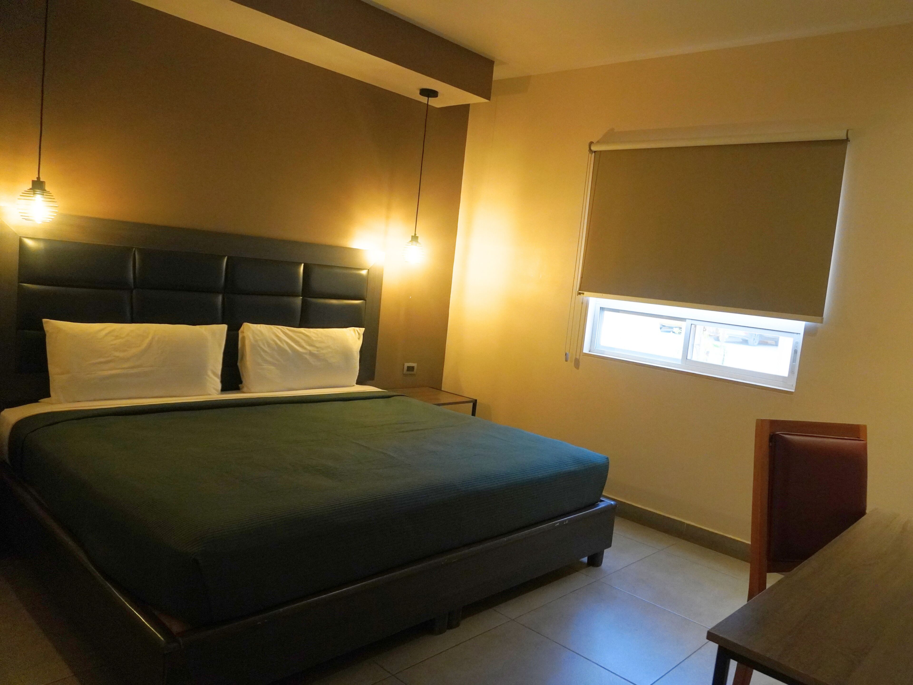 Deluxe Suite | Down comforters, desk, laptop workspace, iron/ironing board (on request)